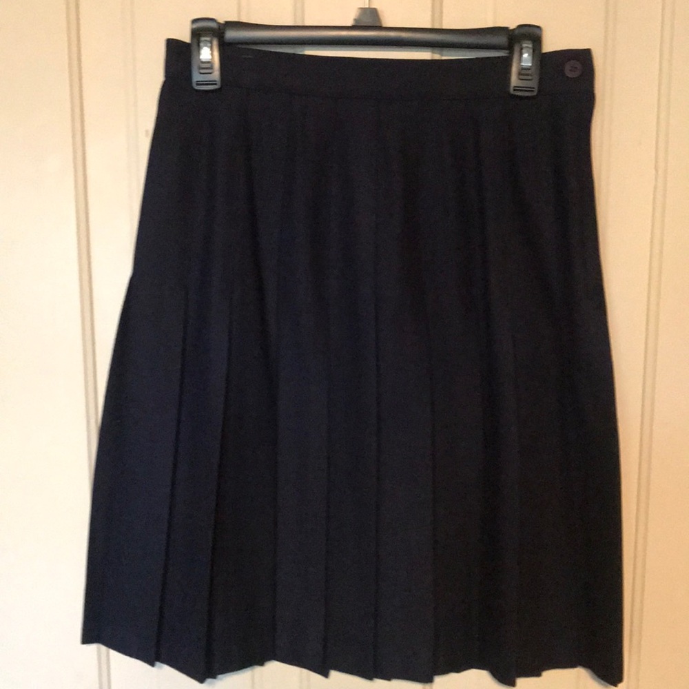 Women’s pleated navy wool skirt.